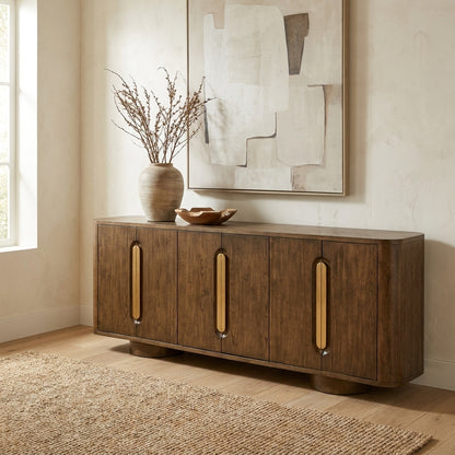 Wooden sideboard with oval handles and round feet.