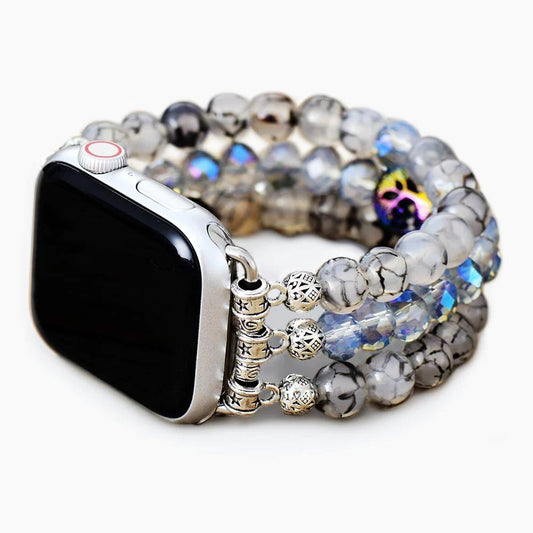 Smartwatch with a multicolored beaded band.