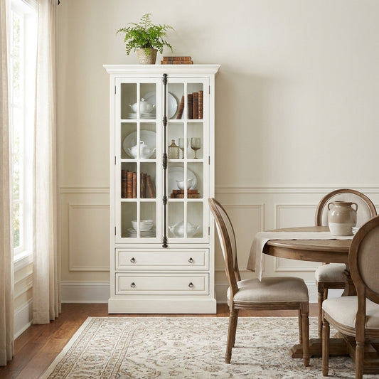 White cabinet with glass-paneled doors and two drawers at the bottom.