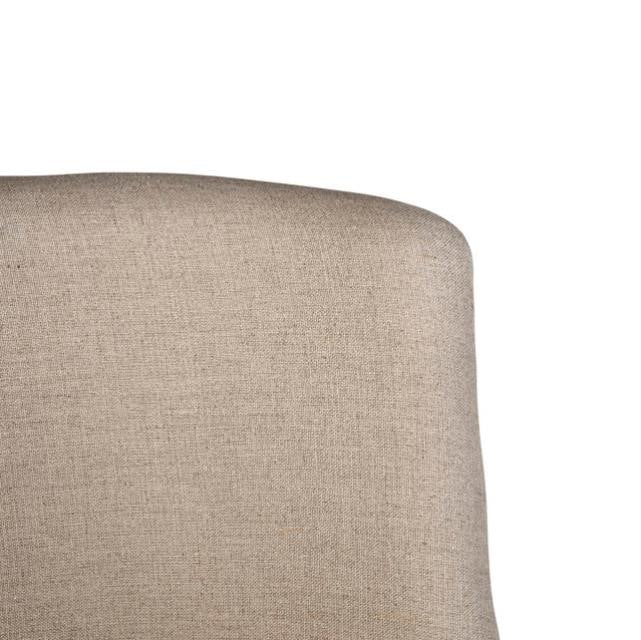 Beige upholstered chair back, minimal design.