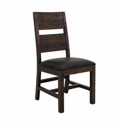 Dark wooden chair with black padded seat.