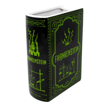 "Frankenstein" book cover with green design on black background.