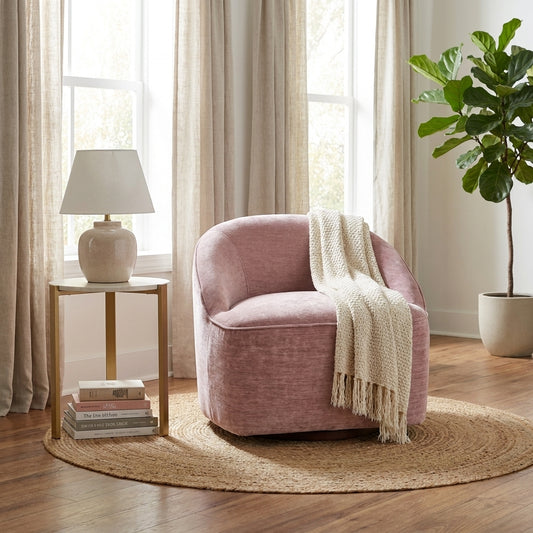 Plush pink swivel chair with a rounded backrest.
