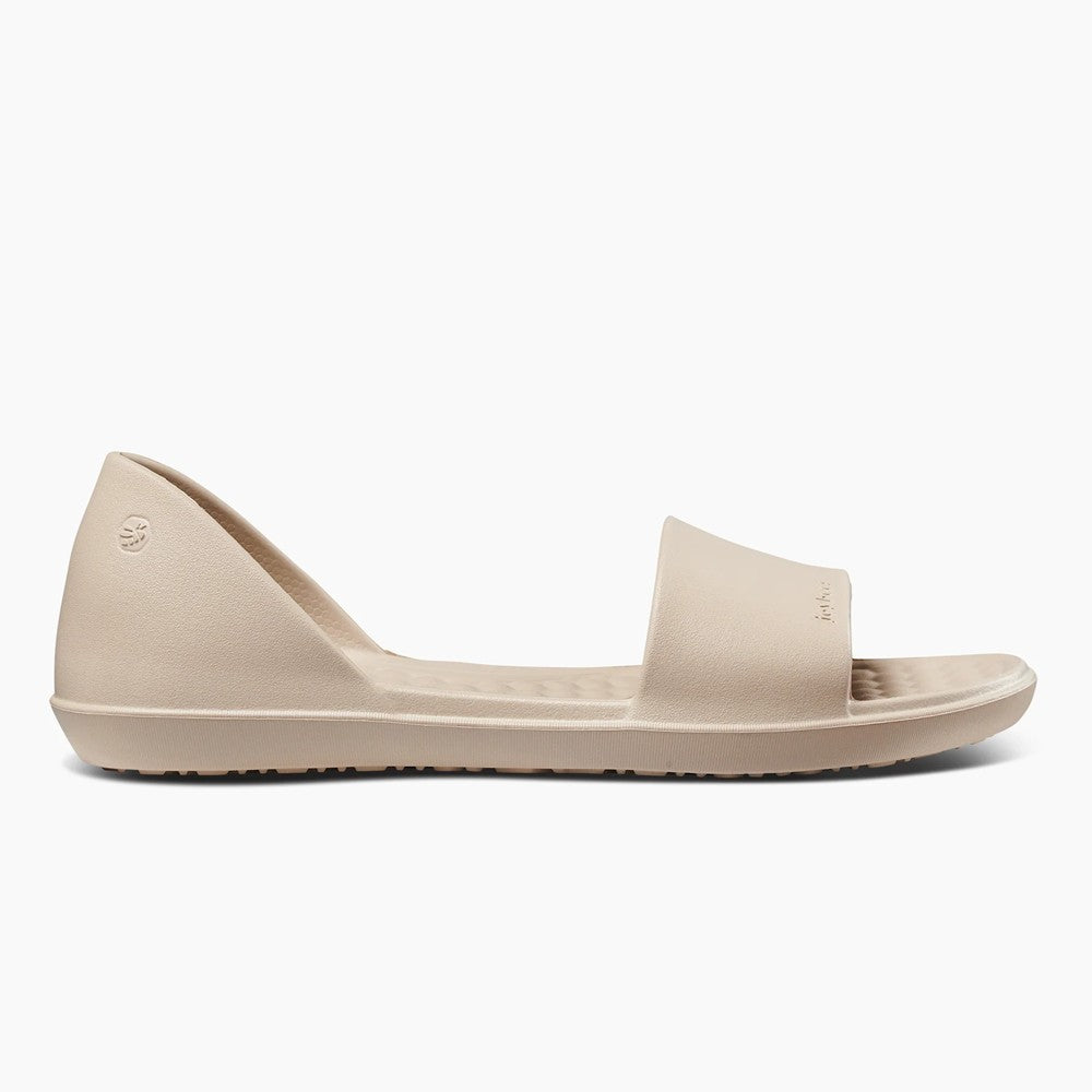 Beige slide sandal with a simple, sleek design.