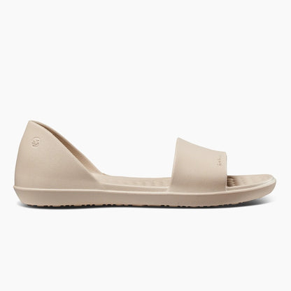 Beige slide sandal with a simple, sleek design.