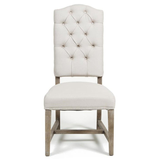 Elegant tufted chair with wooden legs.