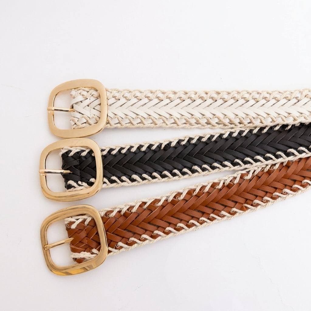 Three braided belts in white, black, and brown with gold buckles.
