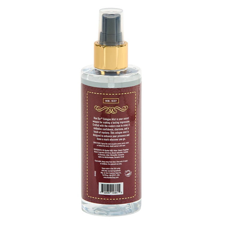 Cologne mist bottle with a brown label and gold pump.