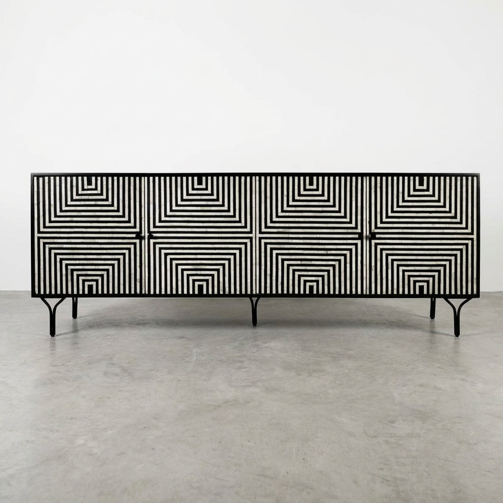 Black and white geometric patterned sideboard with minimalist metal legs.