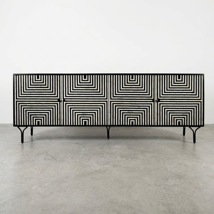 Black and white geometric patterned sideboard with minimalist metal legs.