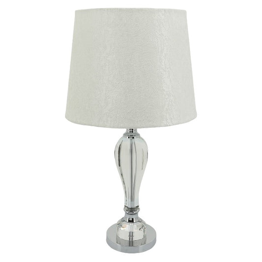 Elegant table lamp with a white shade and silver base.