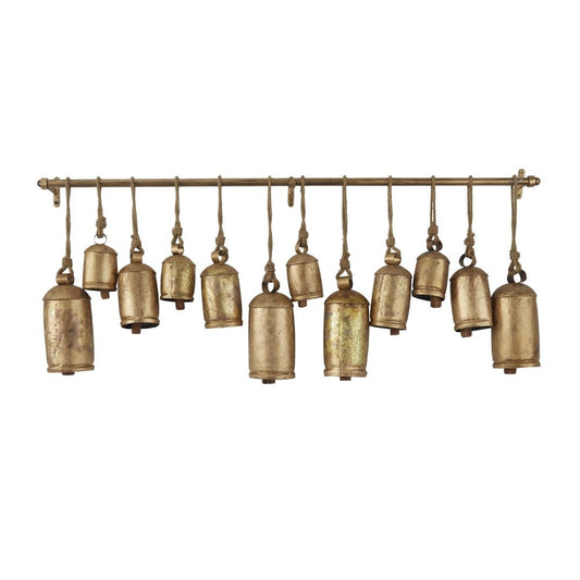 Hanging metal bells on a rod, varying sizes and rustic look.
