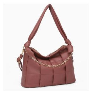 Brown woven bag with a gold chain accent and knot details on the straps.