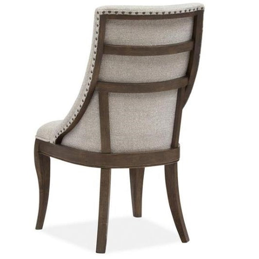 Elegant chair with wooden frame and upholstered backrest.