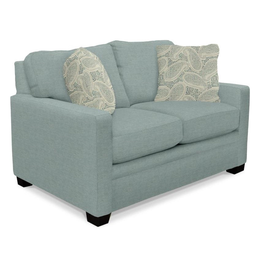 Light blue loveseat with patterned pillows.