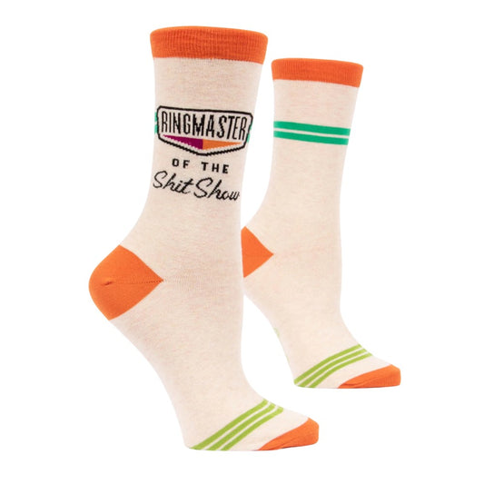 Beige socks with orange accents and humorous text.