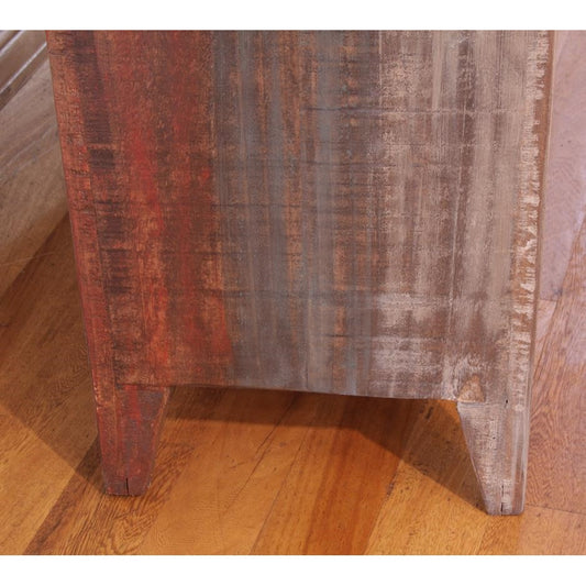 Wooden table leg with rustic, weathered texture.