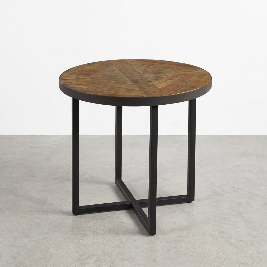 Round wooden table with a black metal base.