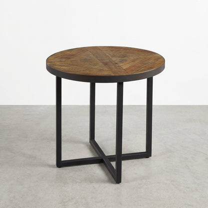 Round wooden table with a black metal base.