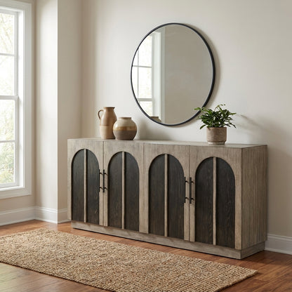 Wooden sideboard with four arched doors and dark handles.