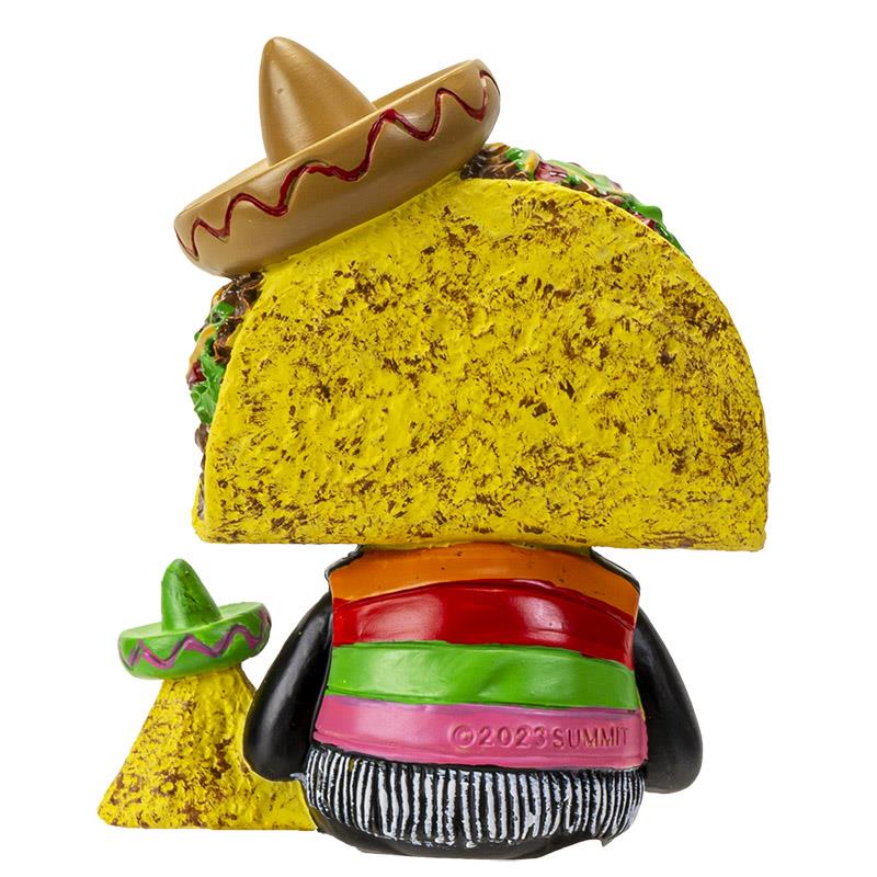 Taco-shaped figurine with a sombrero and colorful striped clothing.