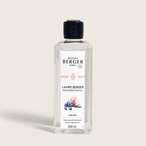 Clear fragrance refill bottle with floral label design.