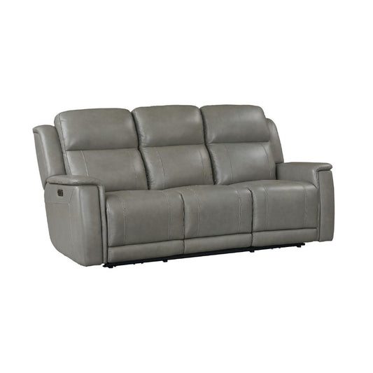Gray leather reclining sofa with cushioned backrests.
