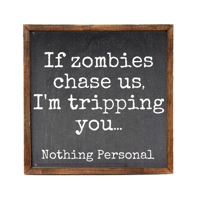 Funny sign about tripping you to escape zombies.