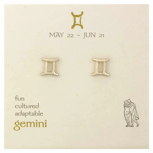 Gemini earrings on a zodiac-themed card.