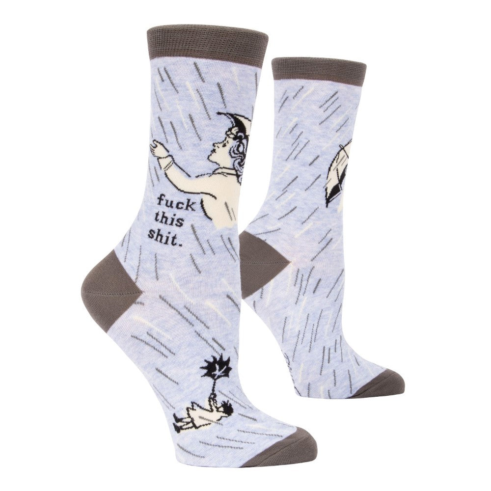 Light blue socks with phrase and cartoon in rain.