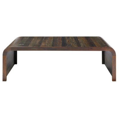 Low wooden coffee table with a simple, sturdy design.