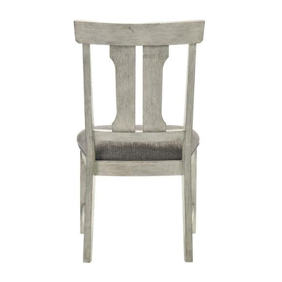 Gray wooden chair with a cushioned seat, viewed from the back.