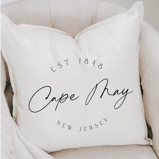 Cushion with "Cape May, New Jersey" print.
