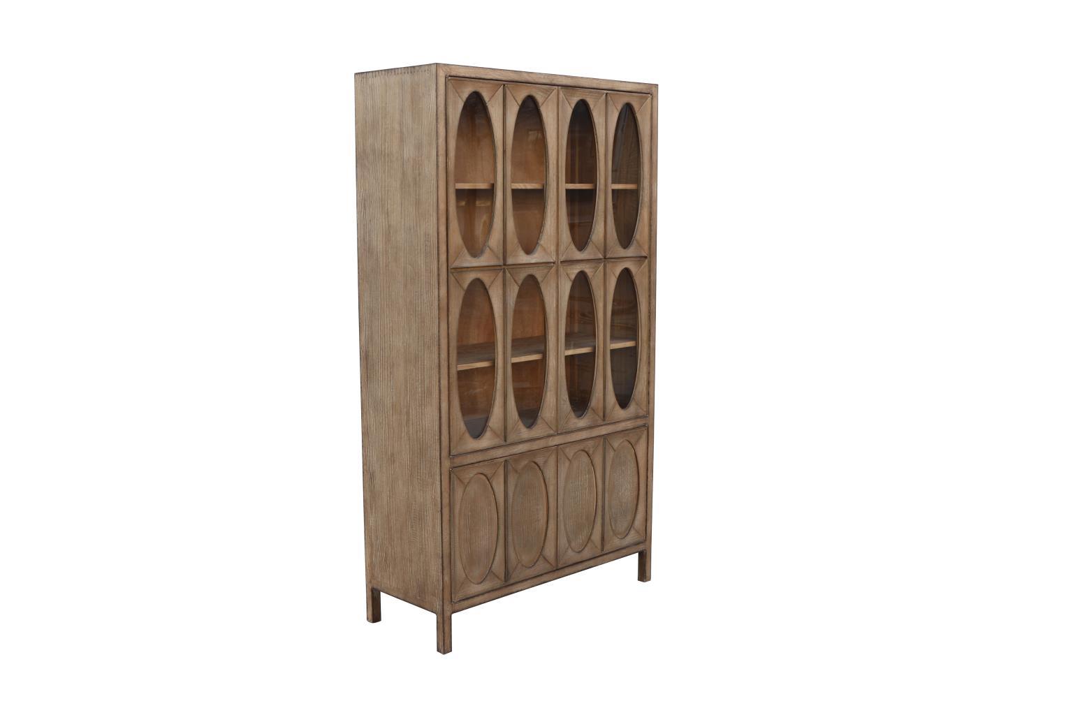 Tall wooden cabinet with oval patterned doors.