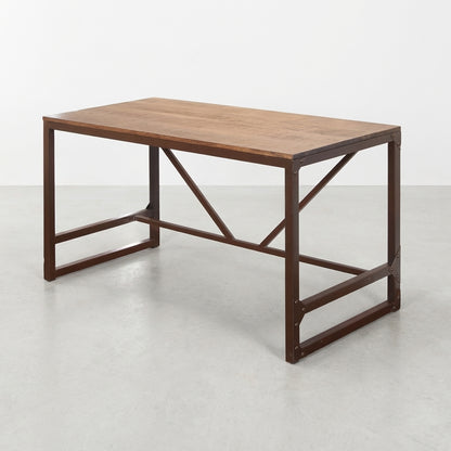 Wooden table with metal frame and industrial design.