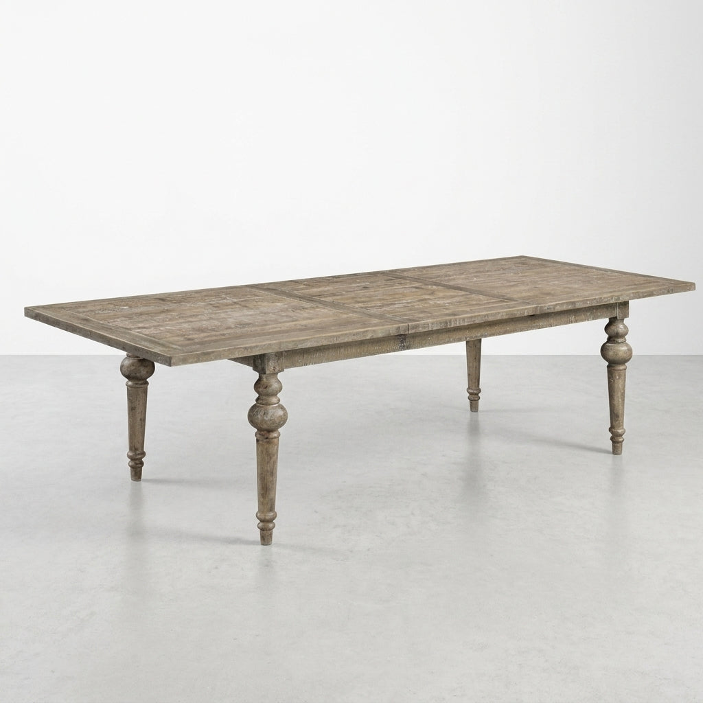 Rustic wooden dining table with turned legs.