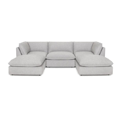 Gray, L-shaped sectional sofa with cushioned seats and backrests.