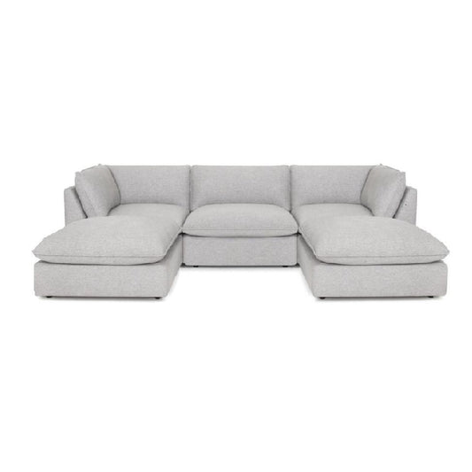 Gray, L-shaped sectional sofa with cushioned seats and backrests.