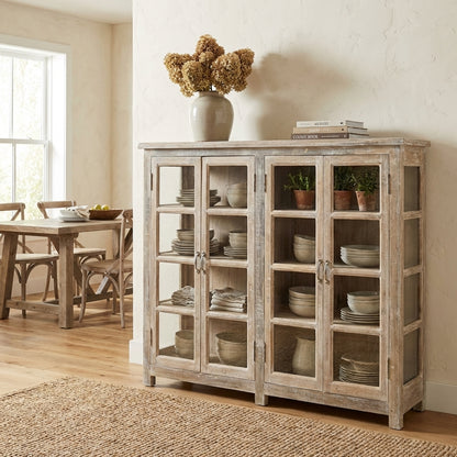 Rustic wooden cabinet with glass paneled doors and shelves.