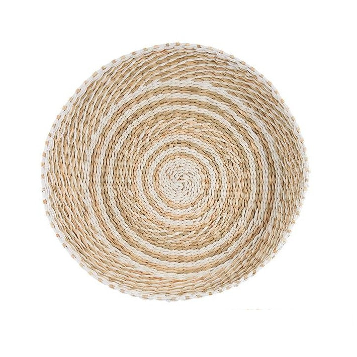 Round woven basket with concentric patterns.
