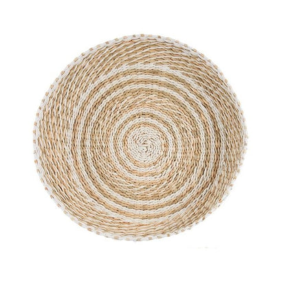 Round woven basket with concentric patterns.