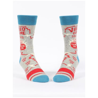 Grey socks with video game theme, blue cuffs and toes, red patterns.