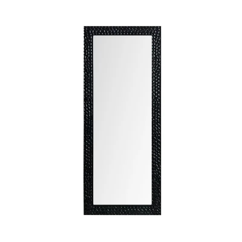 Tall rectangular mirror with a textured black frame.