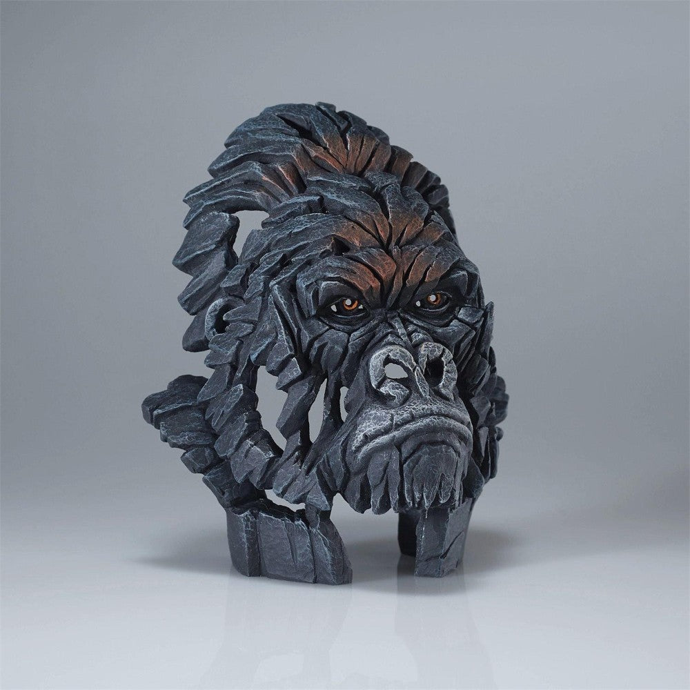 Abstract gorilla sculpture with a layered, textured design.