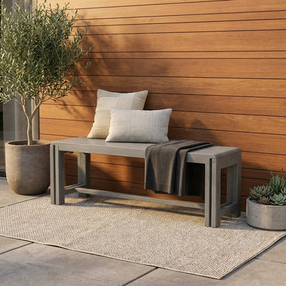 Black plastic bench with a slatted seat design.