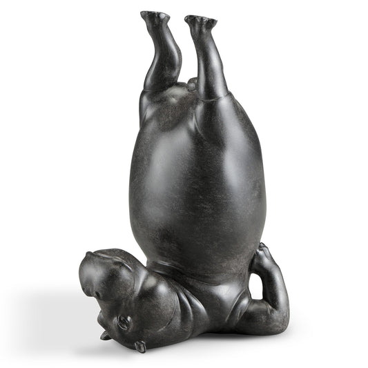 Sculpture of an upside-down hippo.