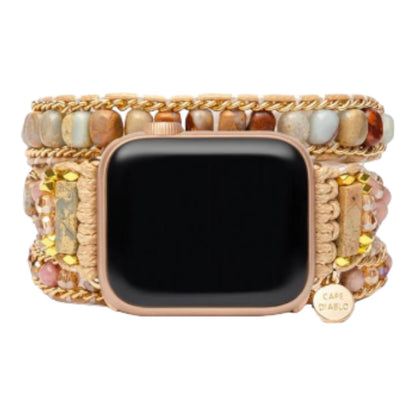 Stylish watch with a beaded and woven strap design.