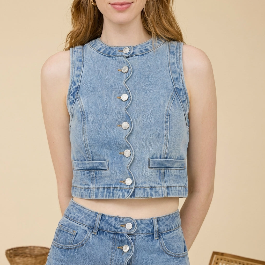 Woman in a denim set with wavy button design.