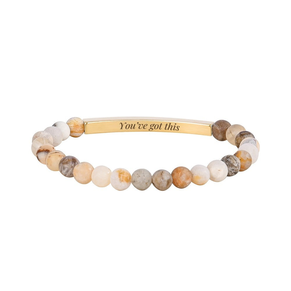 Beaded bracelet with gold bar, "You've got this" inscription.