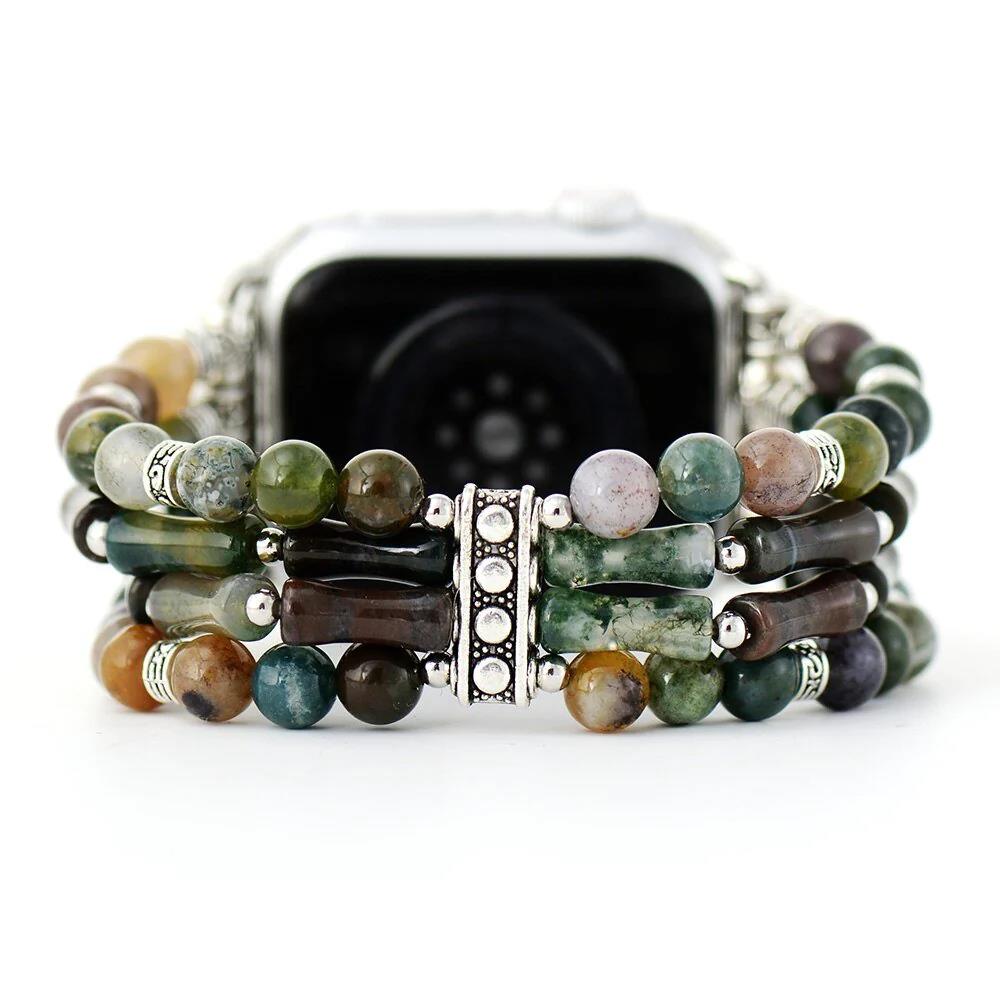 Colorful beaded watch band with intricate metal accents.